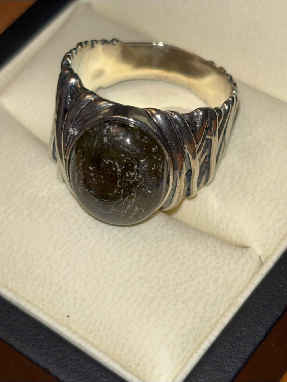 Or Paz Sterling Silver Ring with color changing stone.  Box not included.